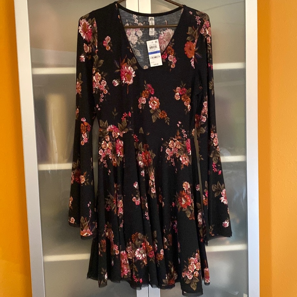 Long bell sleeve black and floral dress.